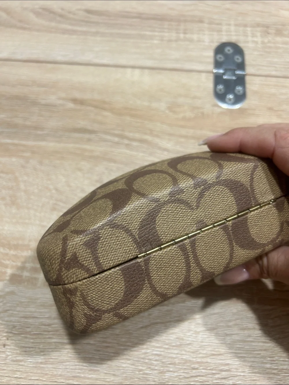 Coach hard shell sunglass case.